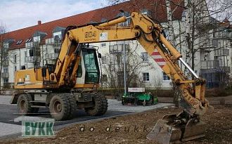 Liebherr Litronic 904 ( колесный дизельный экскаватор)