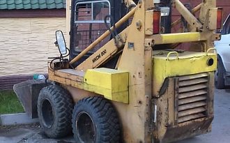 МКСМ 800 (коммунальная машина / погрузчик / дизельные, аккумуляторные, газовые / фронтальный / вилочный / экскаваторный ковш / коммунальная щетка)