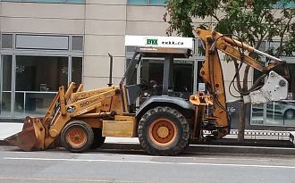 CASE 580 super LE (колесный дизельный фронтальный погрузчик / экскаватор)